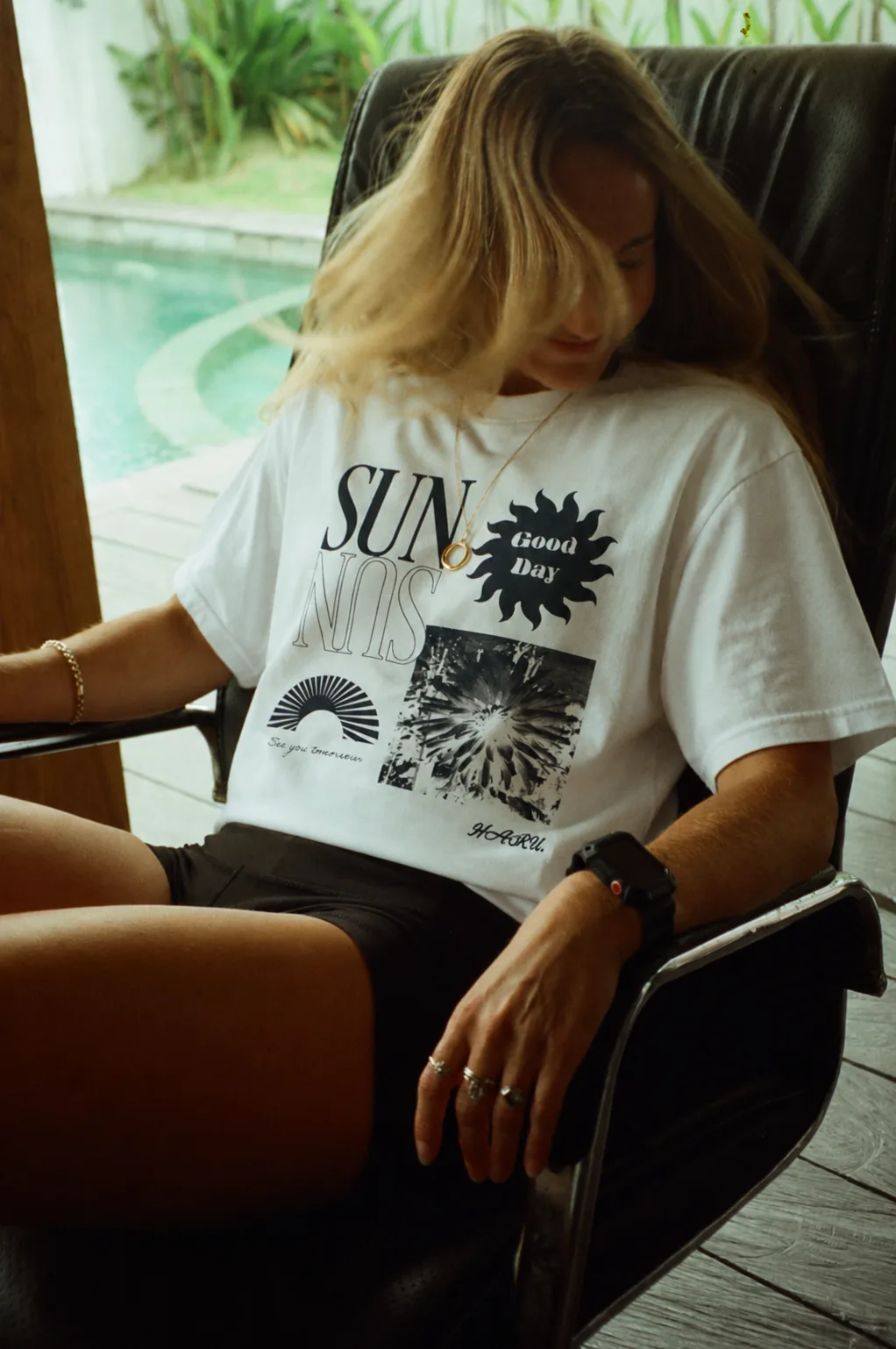 womens_sun_graphic_tshirt HARU oversized white graphic T-shirt with sun illustration and abstract print
